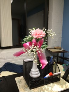 Pink. Pink cannot be escaped. There were two carnations, but one lost its head in the car as I drove home because I kept hitting it with my elbow, because I drive with manual shift.